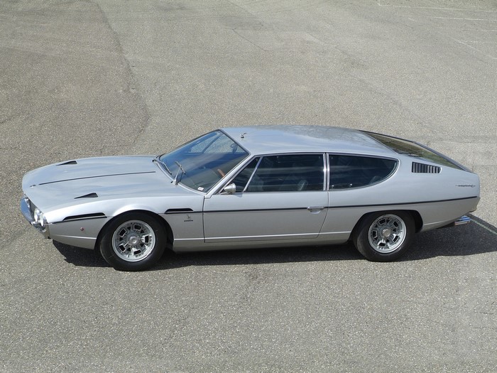 Silver Lamborghini Espada parked on asphalt