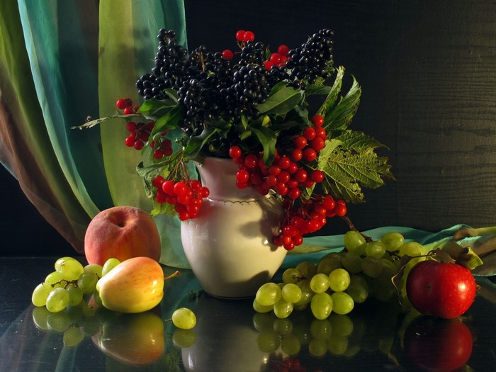 Still life with fruits and berries
