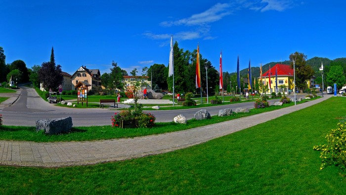 Austrian town square with flags and buildings