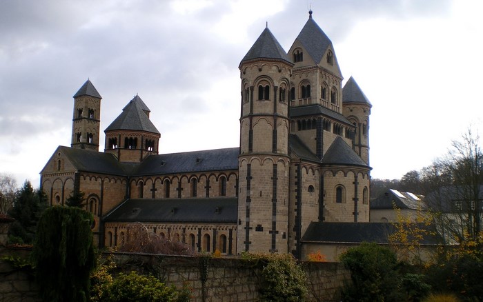 Romanesque Basilica with multiple towers and spires