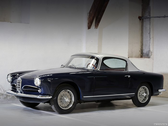 Dark Blue Alfa Romeo Spider in a Garage