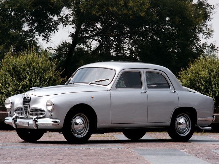 Silver Alfa Romeo car parked outdoors