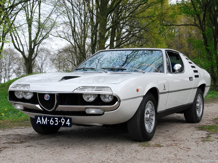 White Alfa Romeo Montreal parked outdoors