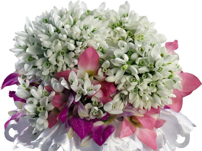 Bouquet of white snowdrops and pink orchids with lace