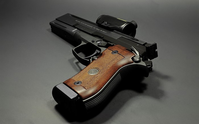 Beretta 87 pistol with red dot sight