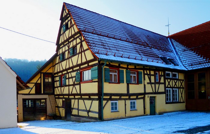Timber-framed house in Germany with snow