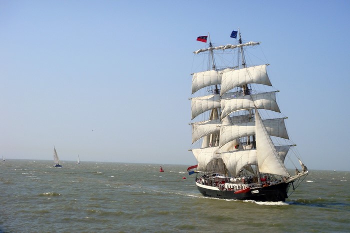 Tall Ship with White Sails on the Water