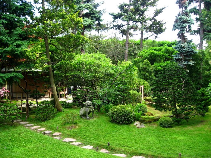 Japanese Garden with Stone Path and Lion Statue