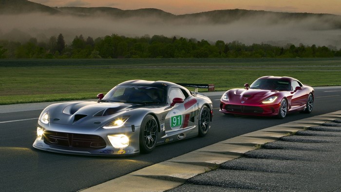 Two Dodge Viper cars on a race track
