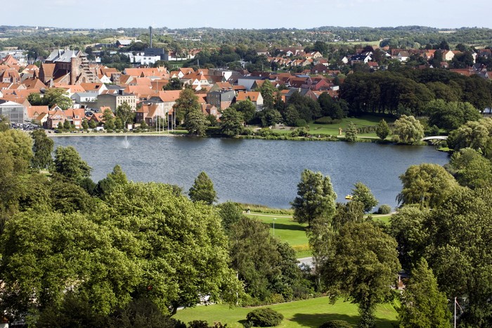 View of a Danish town with a lake and park