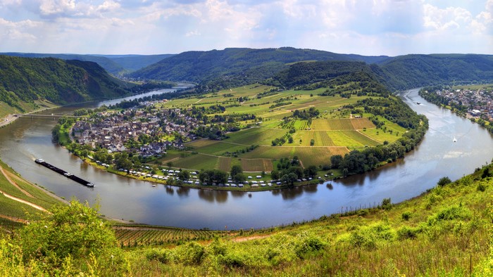 River bend with vineyards and town in Germany
