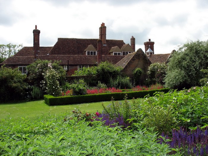 Brick house with a garden in the United Kingdom