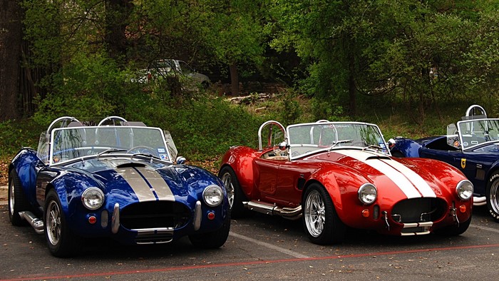 Blue and Red Shelby Cobra Cars