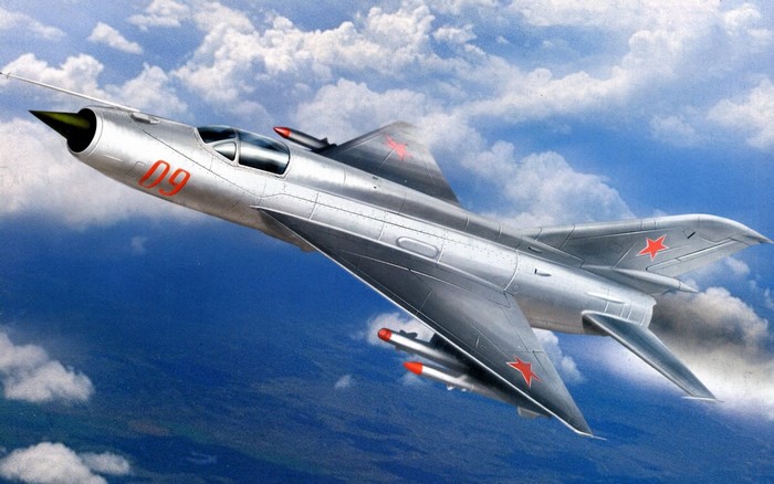 Silver Soviet MiG-21 Fighter Jet in Flight
