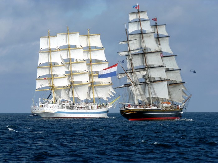 Two tall ships sailing on the ocean