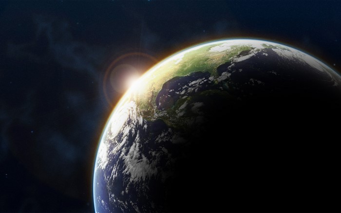 Earth from space with sunrise