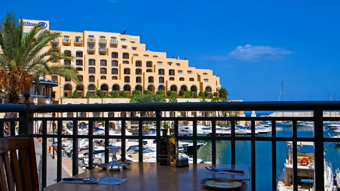 Hilton hotel overlooking a marina in Malta