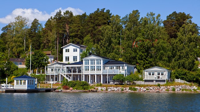 Large white houses on the shore in Sweden