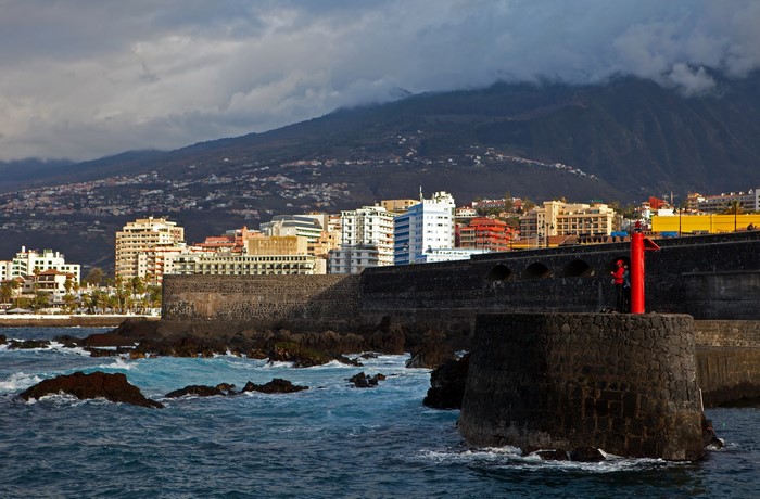 Coastal city with a mountain backdrop in the Canary Islands, Spain