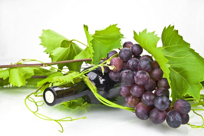 Grapes and a bottle of wine