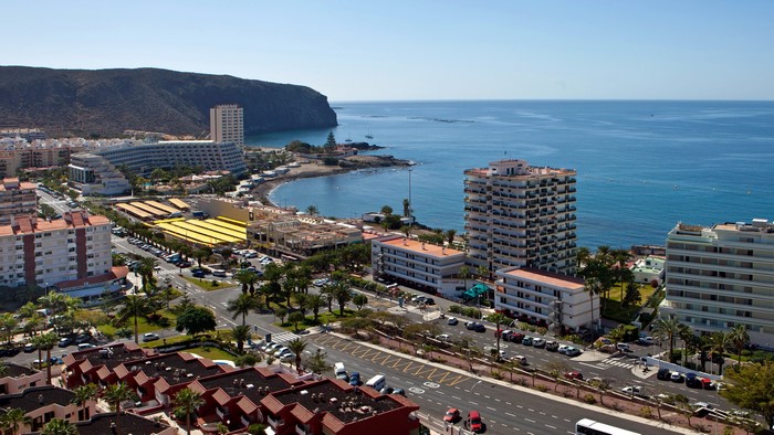 Coastal town with hotels and ocean in Spain