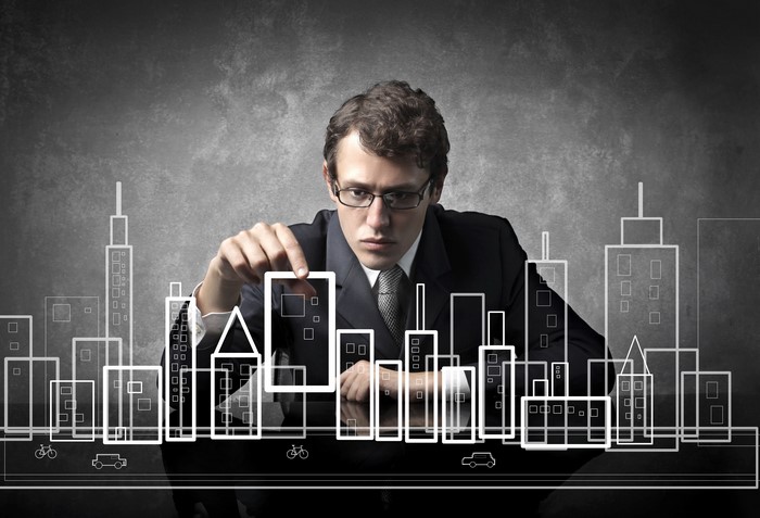 Man designing a city model