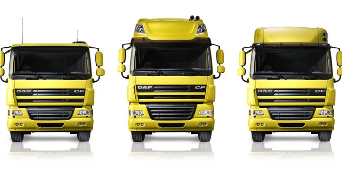 Three yellow DAF CF trucks
