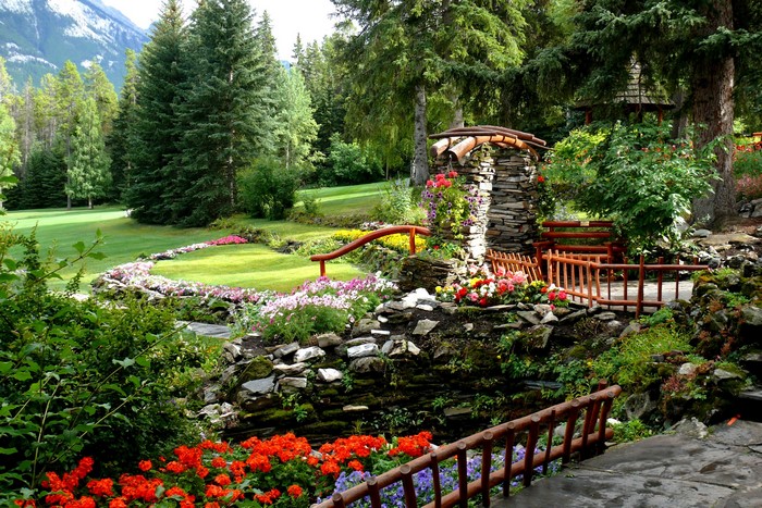 Beautiful park with flowers and stone structures