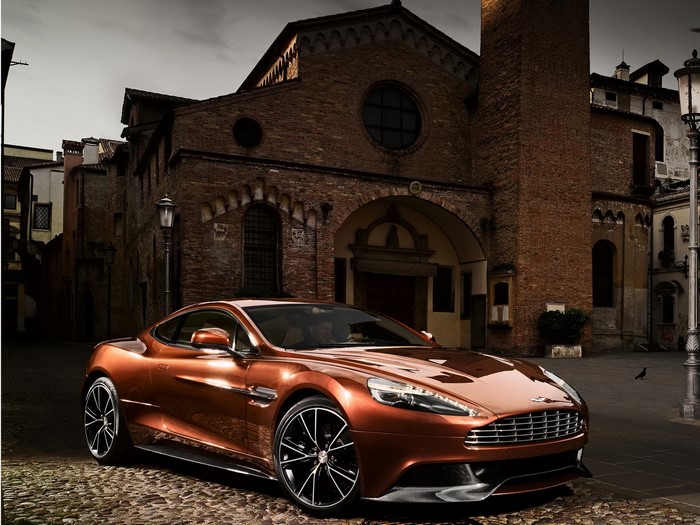 Aston Martin Vanquish parked on cobblestone street