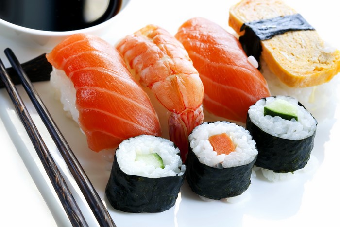 Sushi platter with salmon, shrimp, and tamagoyaki