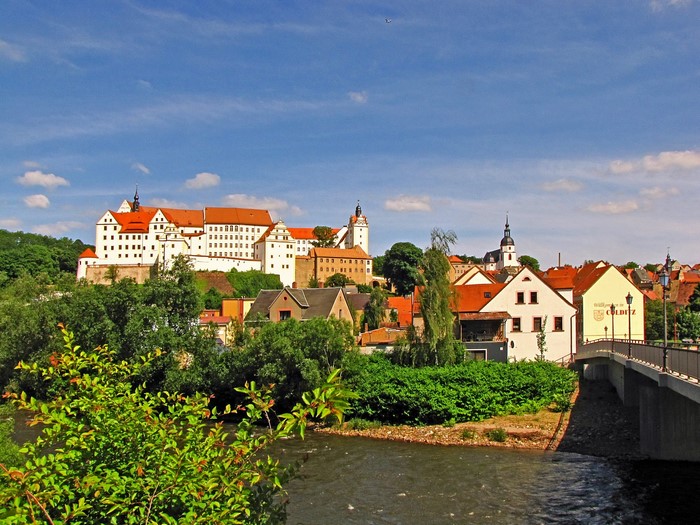 Colditz Castle and town over river in Germany