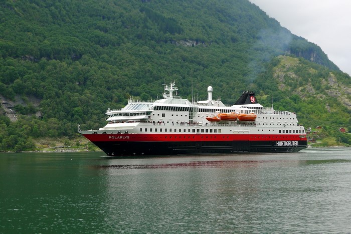 Hurtigruten cruise liner Polarlys sailing in a fjord