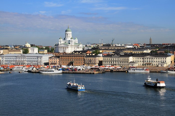 Helsinki Cathedral and harbor with boats