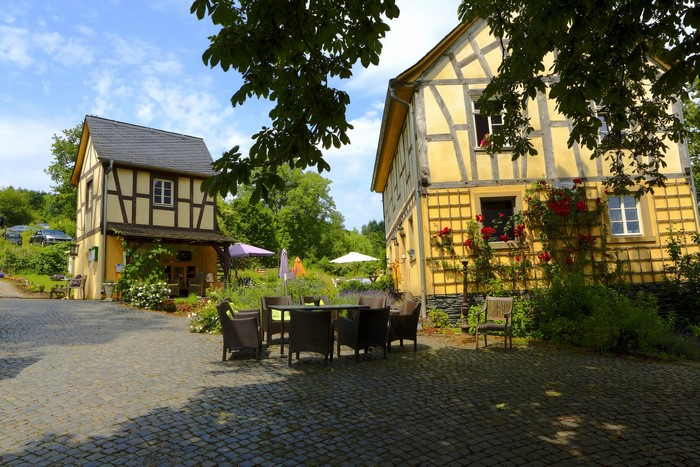 Half-timbered houses with outdoor seating in Germany