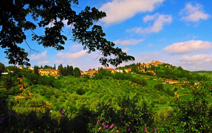 Tuscan village on a hill in Italy