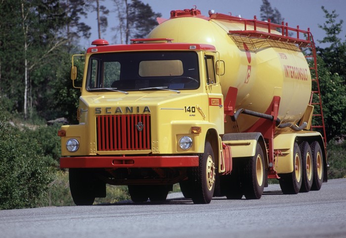 Yellow Scania 140 Super cement truck