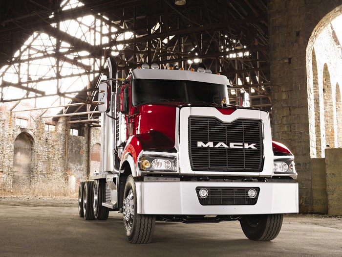 Red Mack Truck in Industrial Building