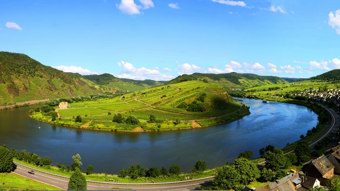 River bend with vineyards and village in Germany