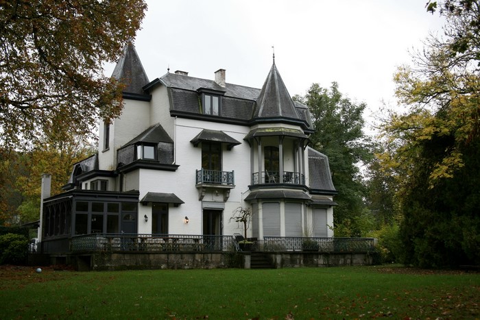White mansion with turrets in Belgium