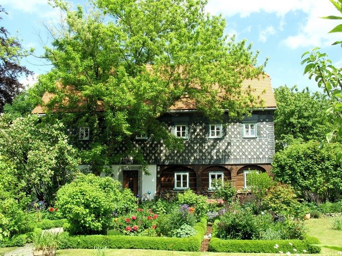 Traditional German house with a lush garden