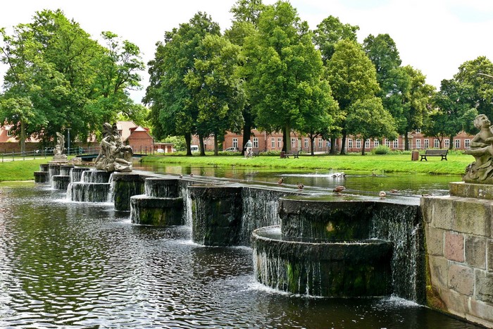 Park with cascading fountains and sculptures