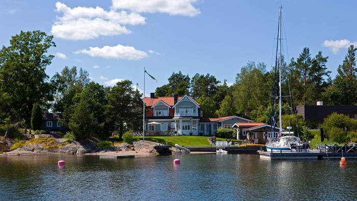 House and sailboat in Svinninge, Sweden