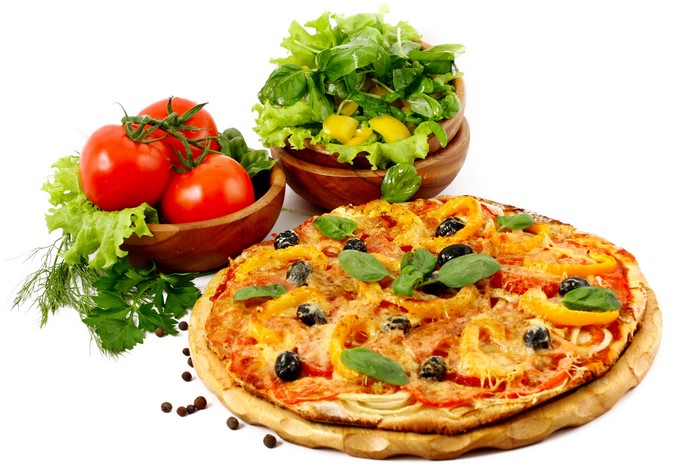 Pizza with tomatoes and salad