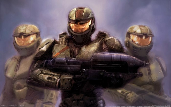 Three Spartans from Halo holding a rifle