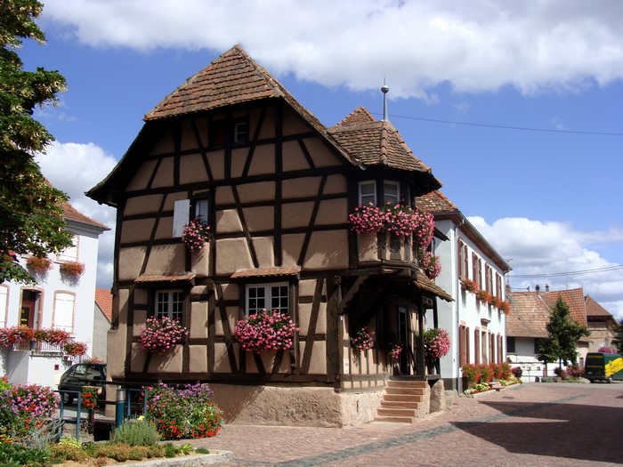 Half-timbered house with flowers in France