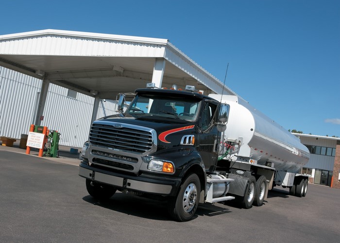 Sterling Trucks fuel tanker truck at a fueling station