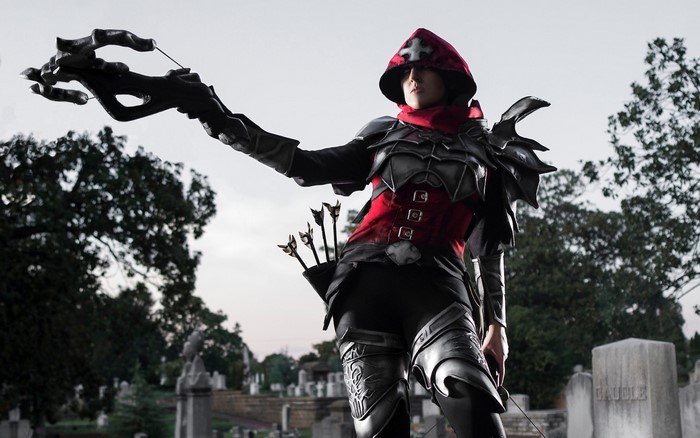 Demon Hunter from Diablo III in a graveyard