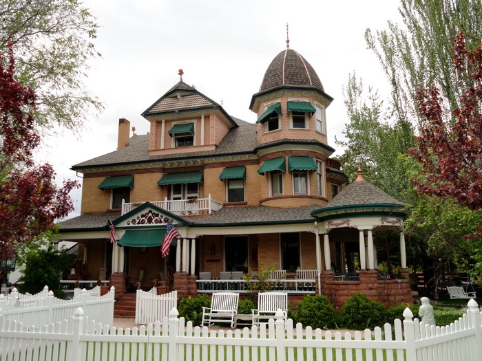 Victorian house in Utah with white picket fence
