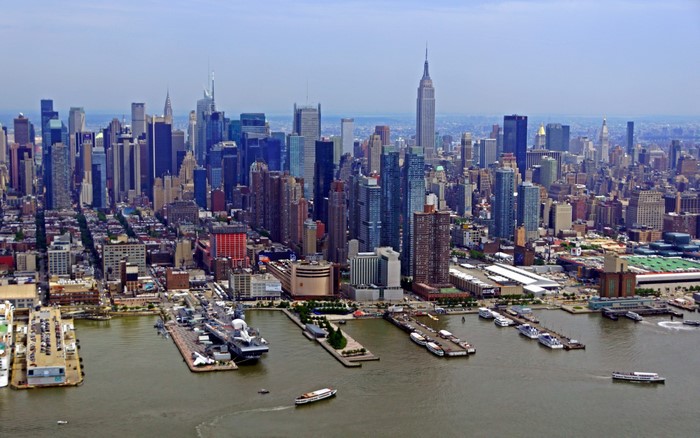 New York City Skyline with Ships in Harbor