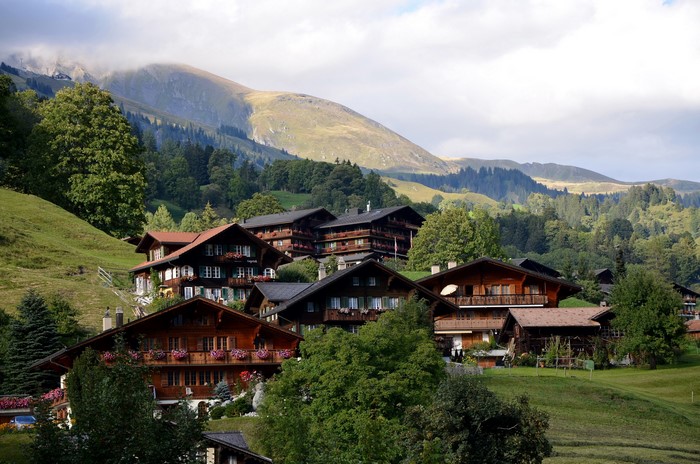 Traditional wooden houses on a hillside in Switzerland